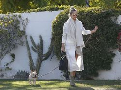 24909962_Chrissy-Teigen--Walking-her-dog
