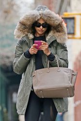 25039001_Irina-Shayk-in-a-fur-hooded-jac