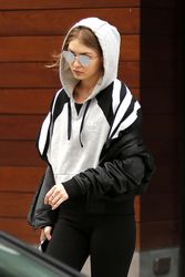 27308228_Gigi-Hadid-in-Tights-Leaves-her